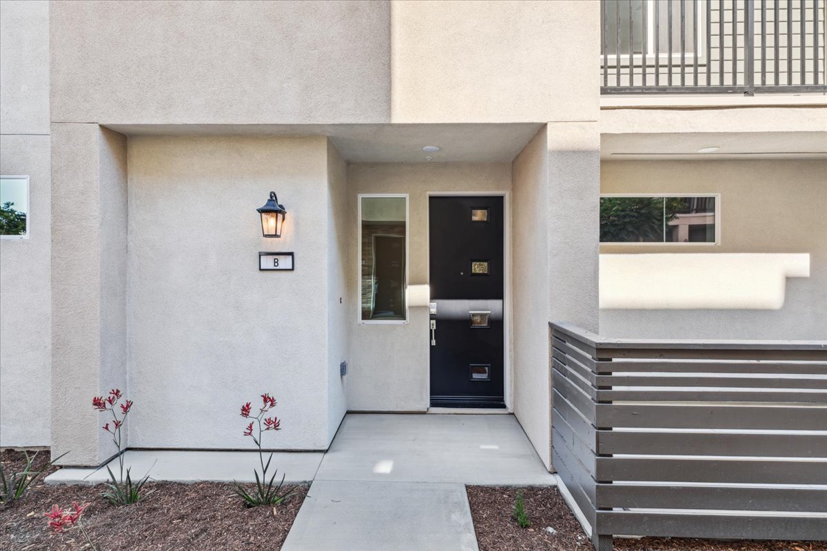 A building with a black door and a black door.