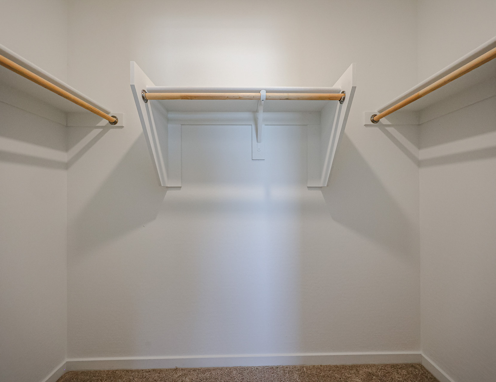 A white staircase with a railing.