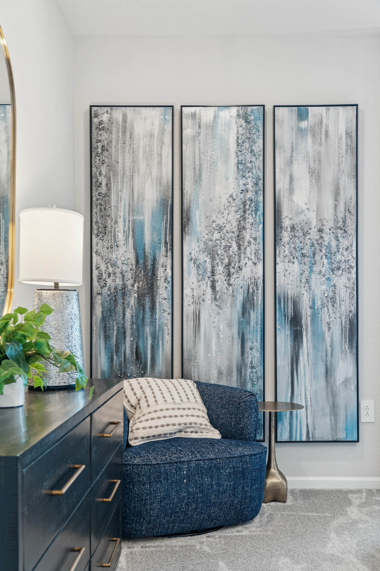 A blue chair in a room.