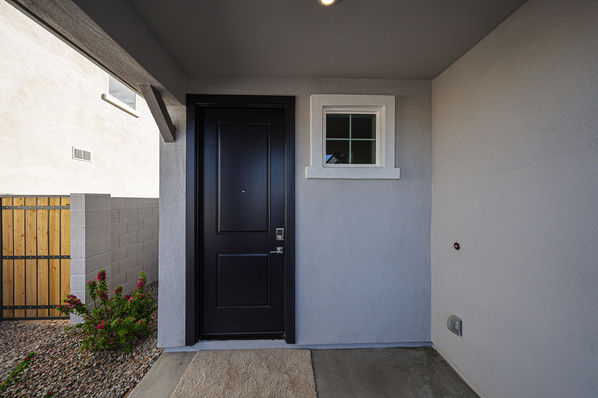 A black door in a building.
