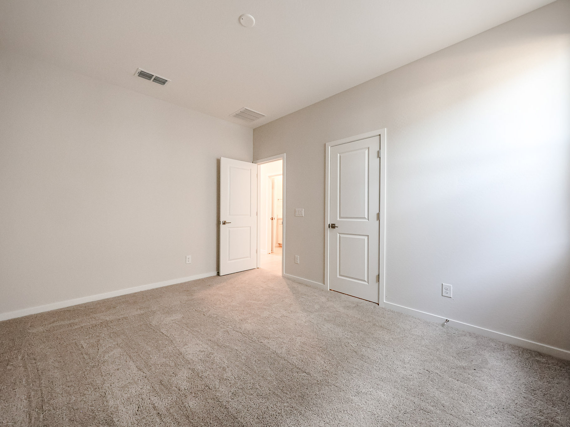 A room with white doors.