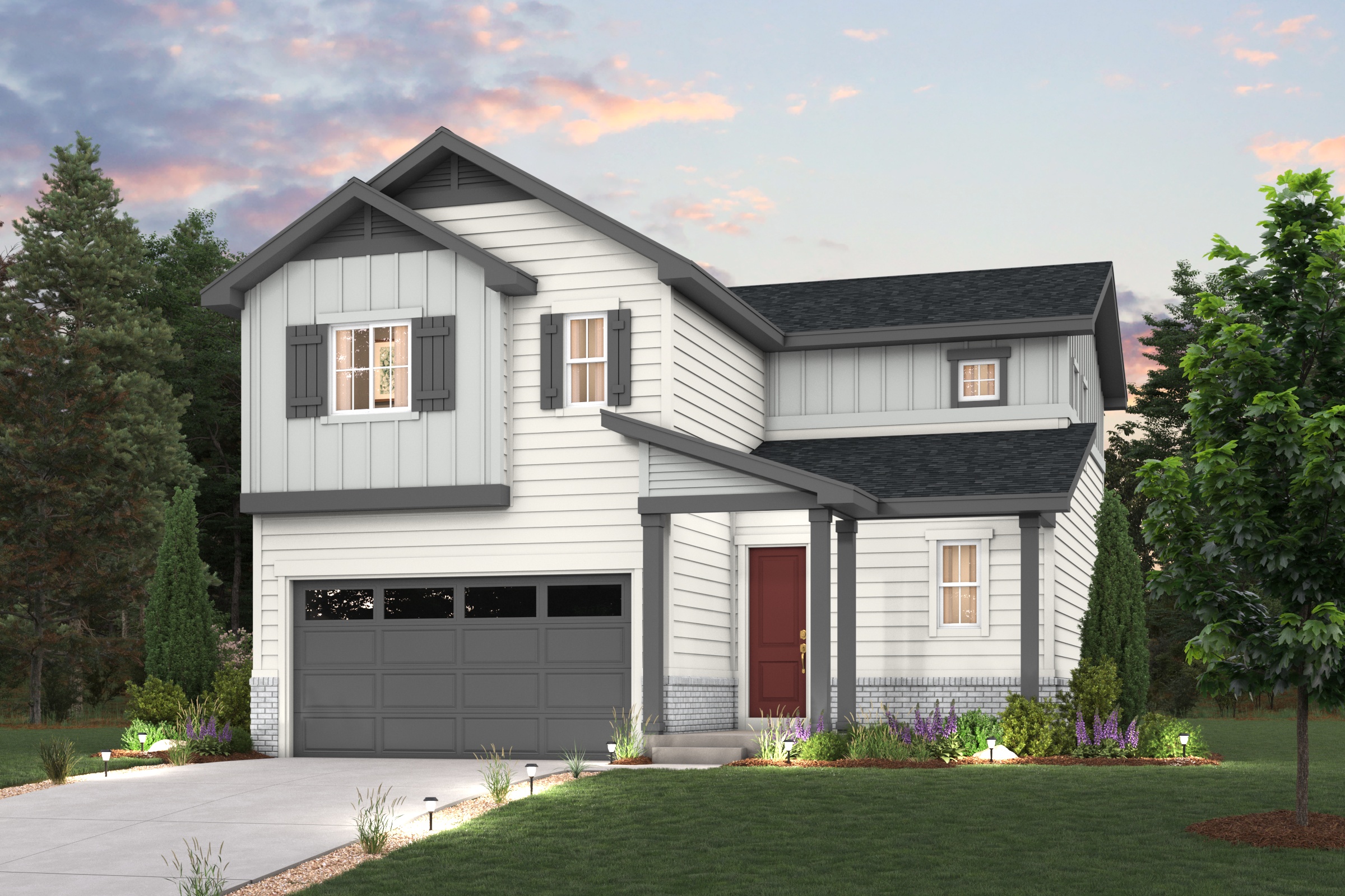 A white house with a garage.
