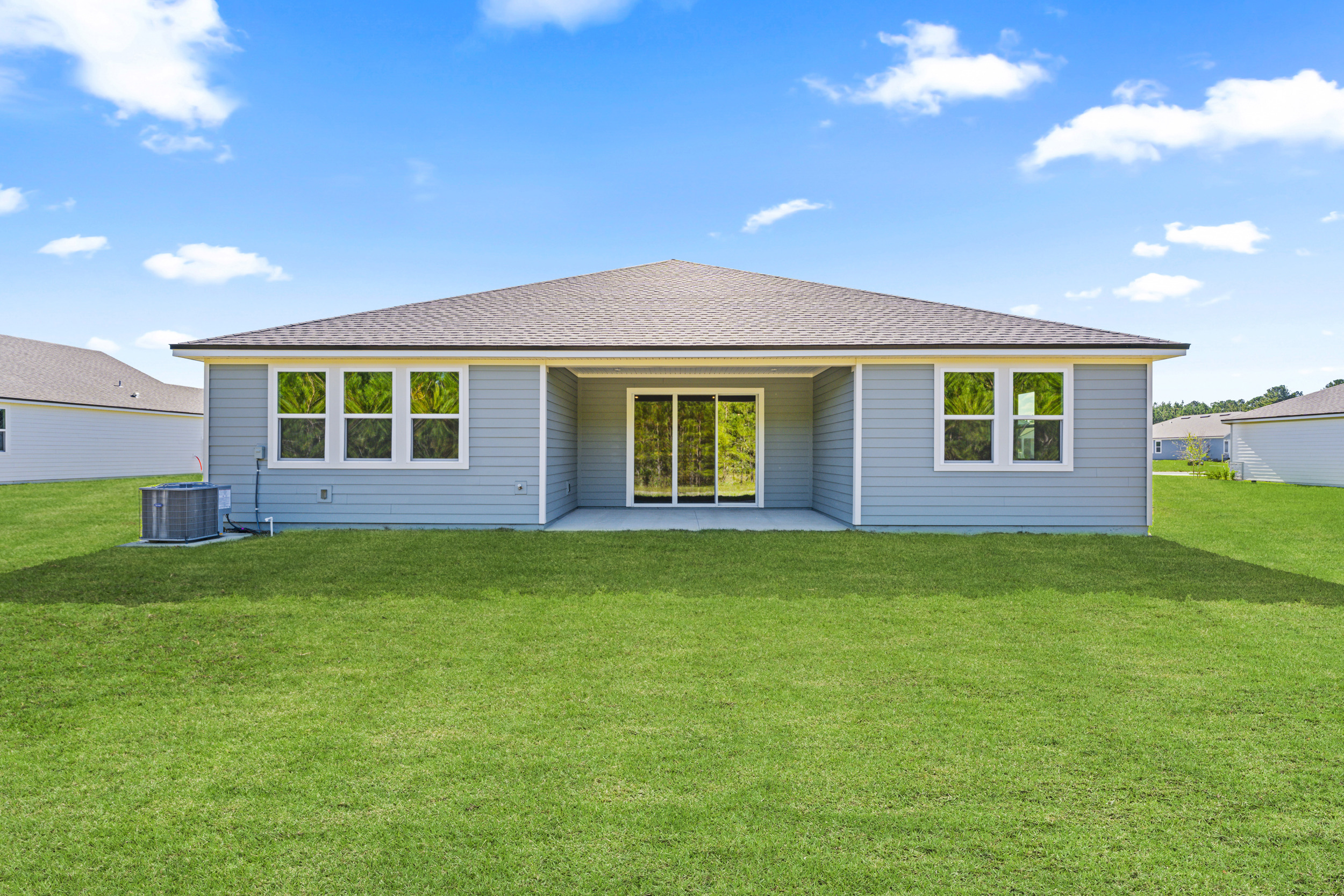 Lot 531 Rear Exterior with Integrated Covered Patio at NorthShore in Kingsland