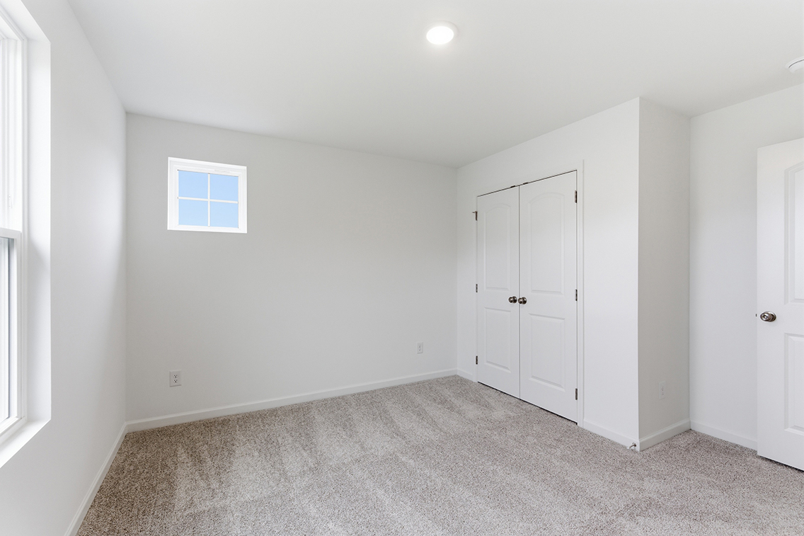 A room with white doors.