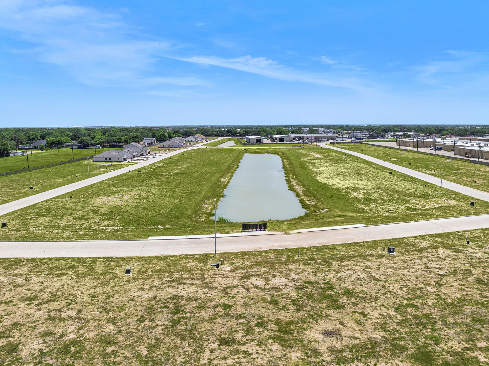A golf course with a green field.