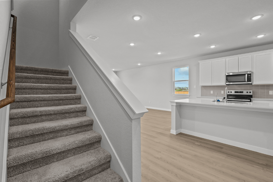 A kitchen and living room.