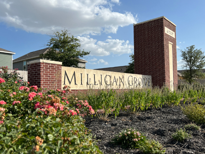 A sign in front of a building.
