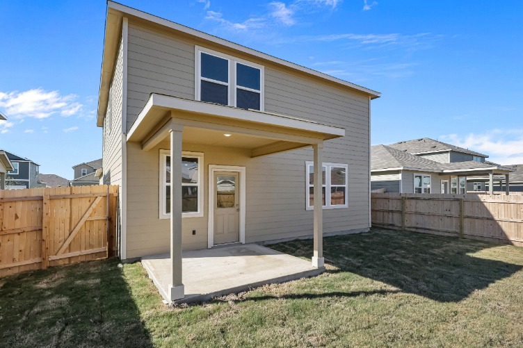 A house with a fence around it.
