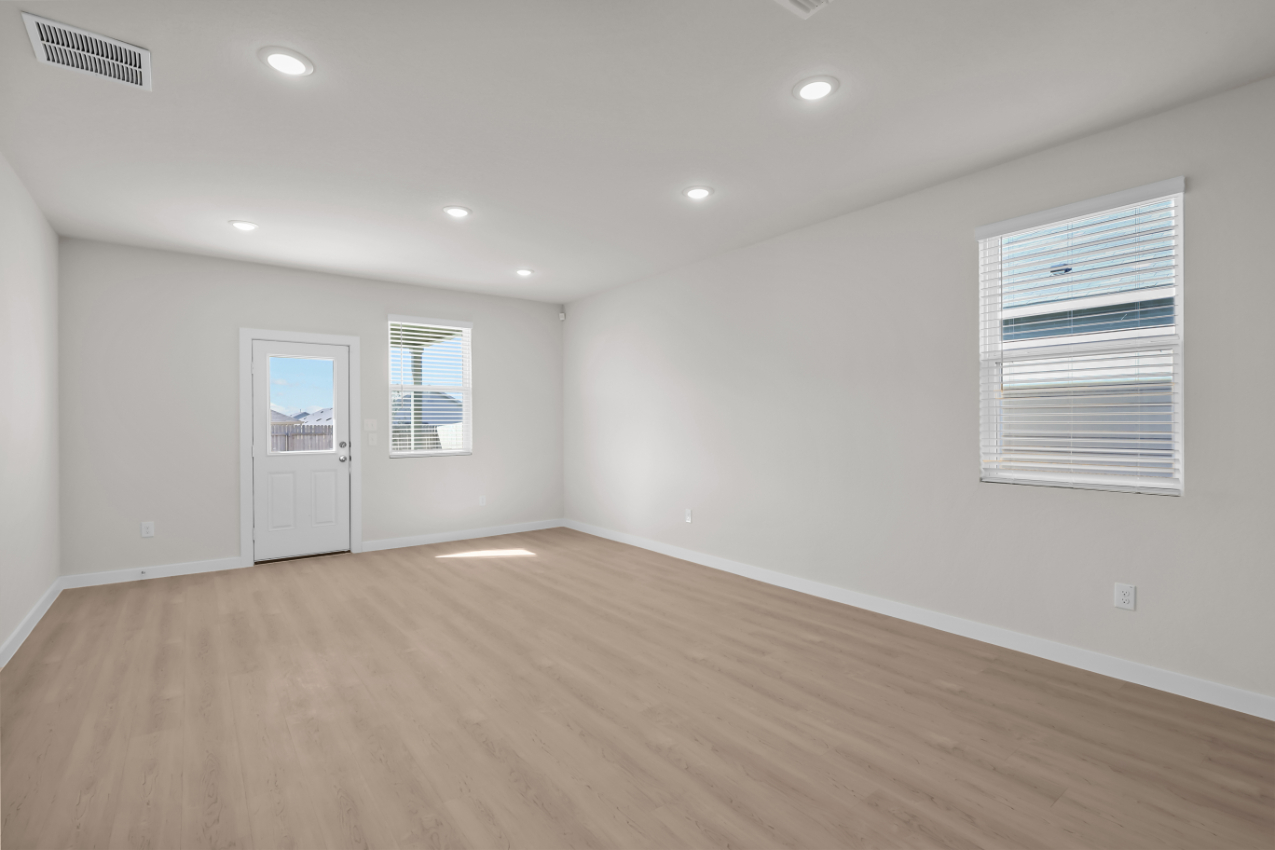 A room with a wood floor and a wood floor.