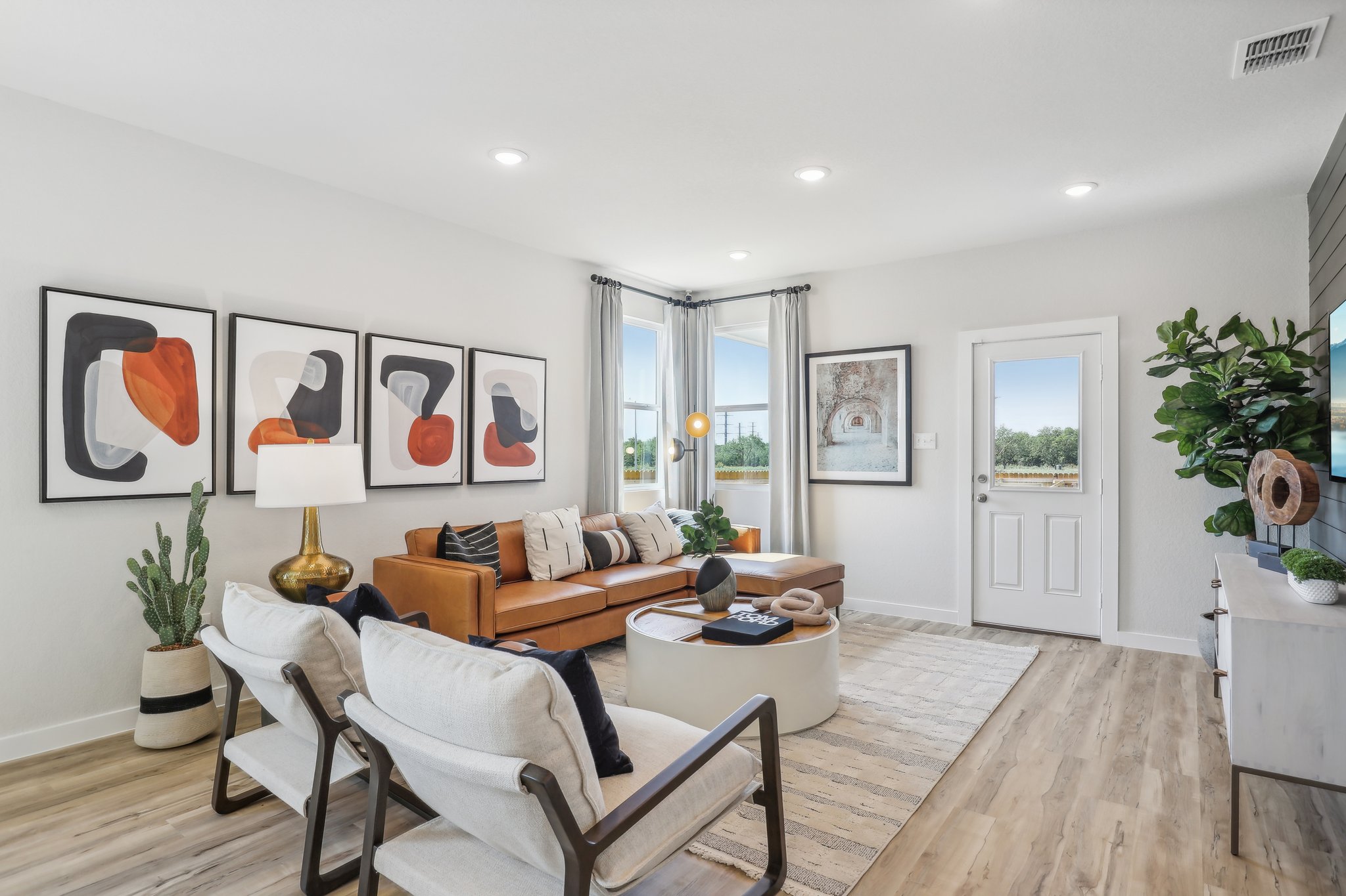 A living room with a couch and a table.