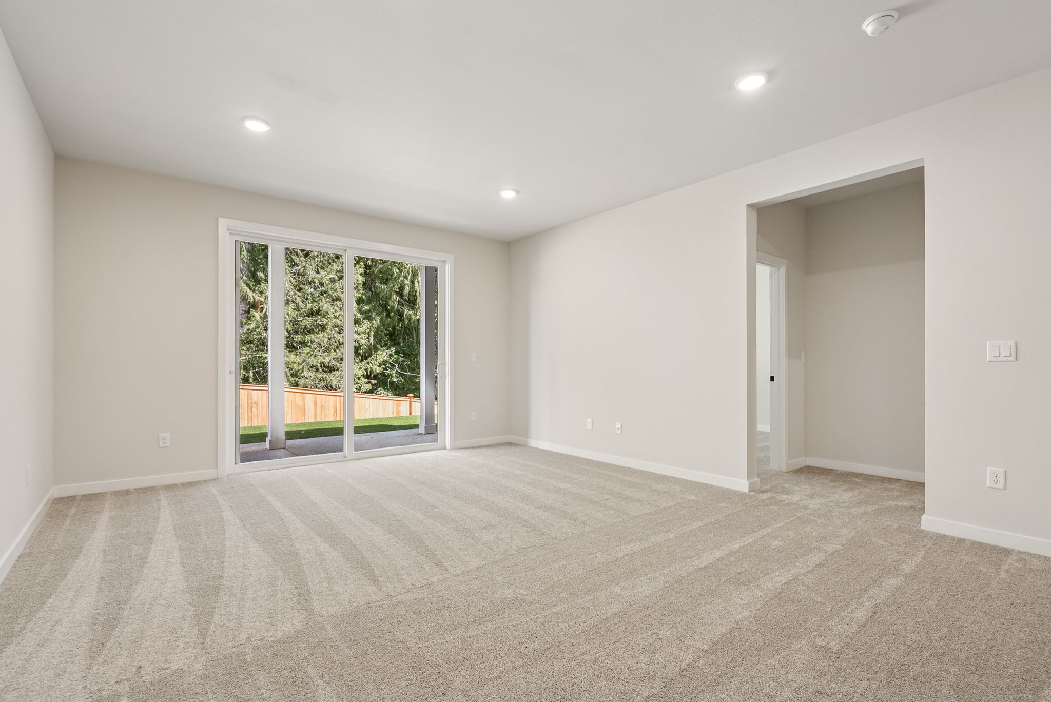 A room with a large window.