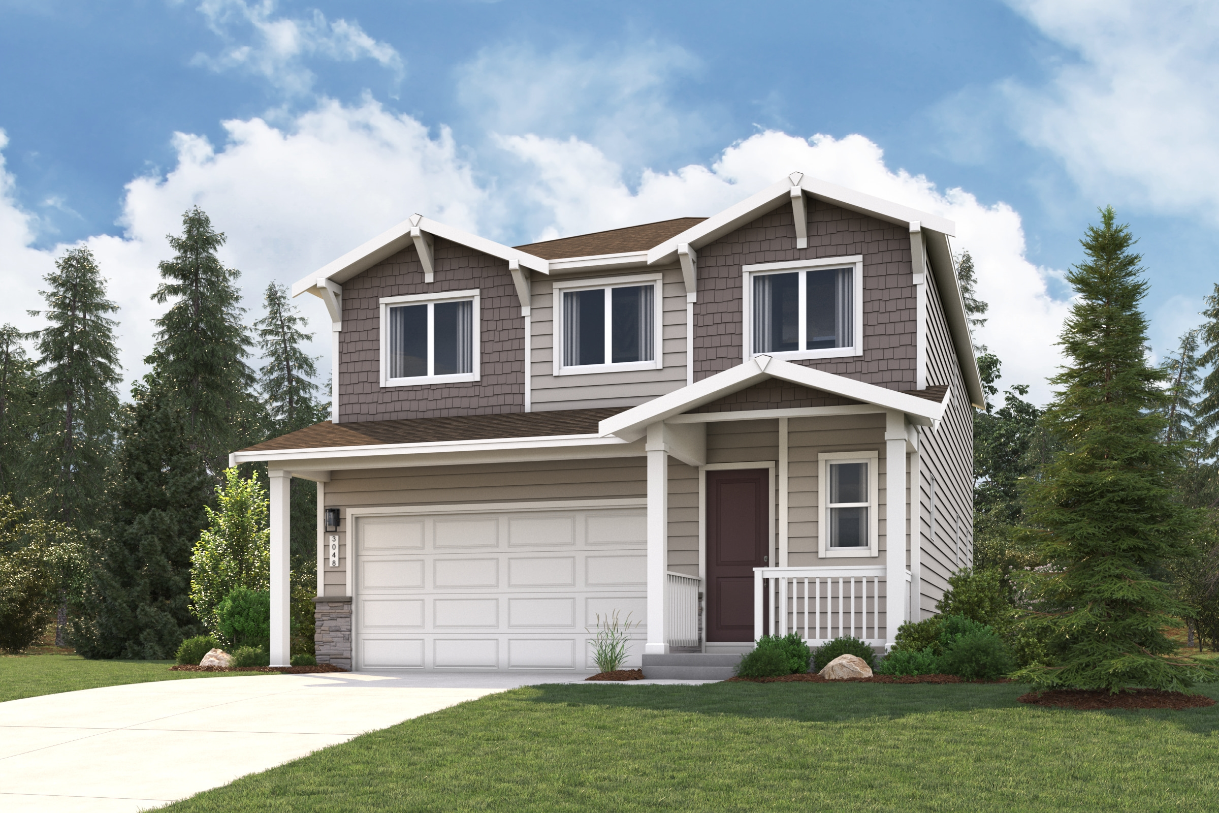 A house with a garage and trees in the back.