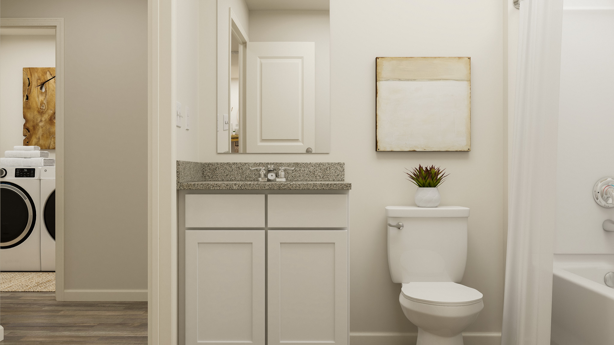 A bathroom with a toilet and sink.