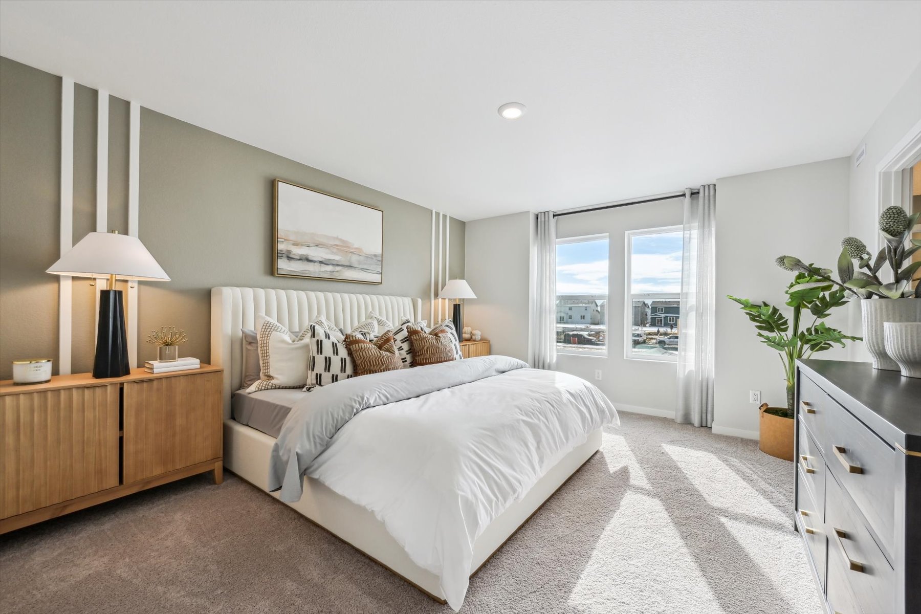 A bedroom with a large bed.